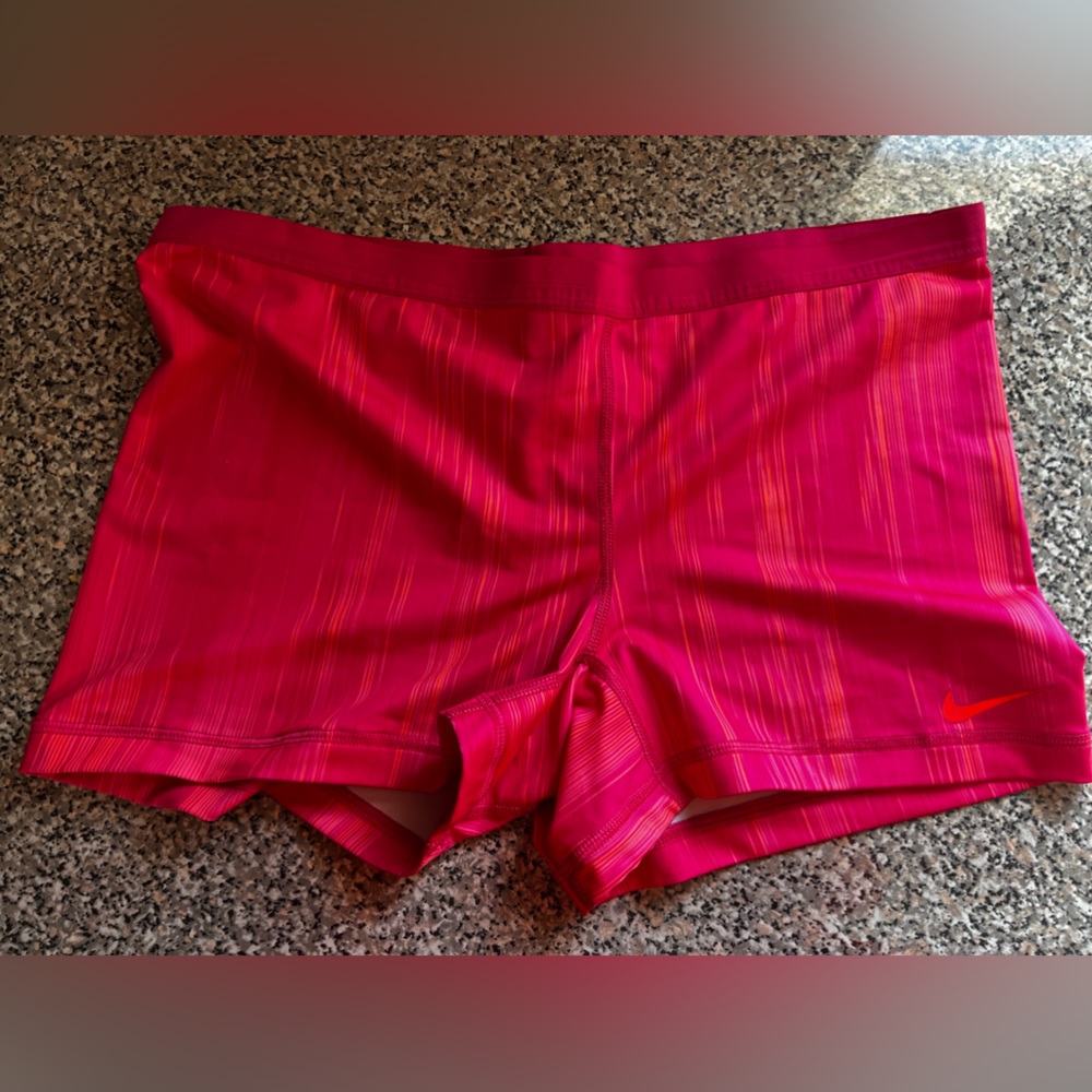 Nike Dry Fit performance shorts hot pink with yellow/orange stripes